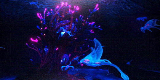 A large underwater tree-like structure with a Ghost Leviathan egg, surrounded by several Ghost Rays. The gif is captured from the game Subnautica.